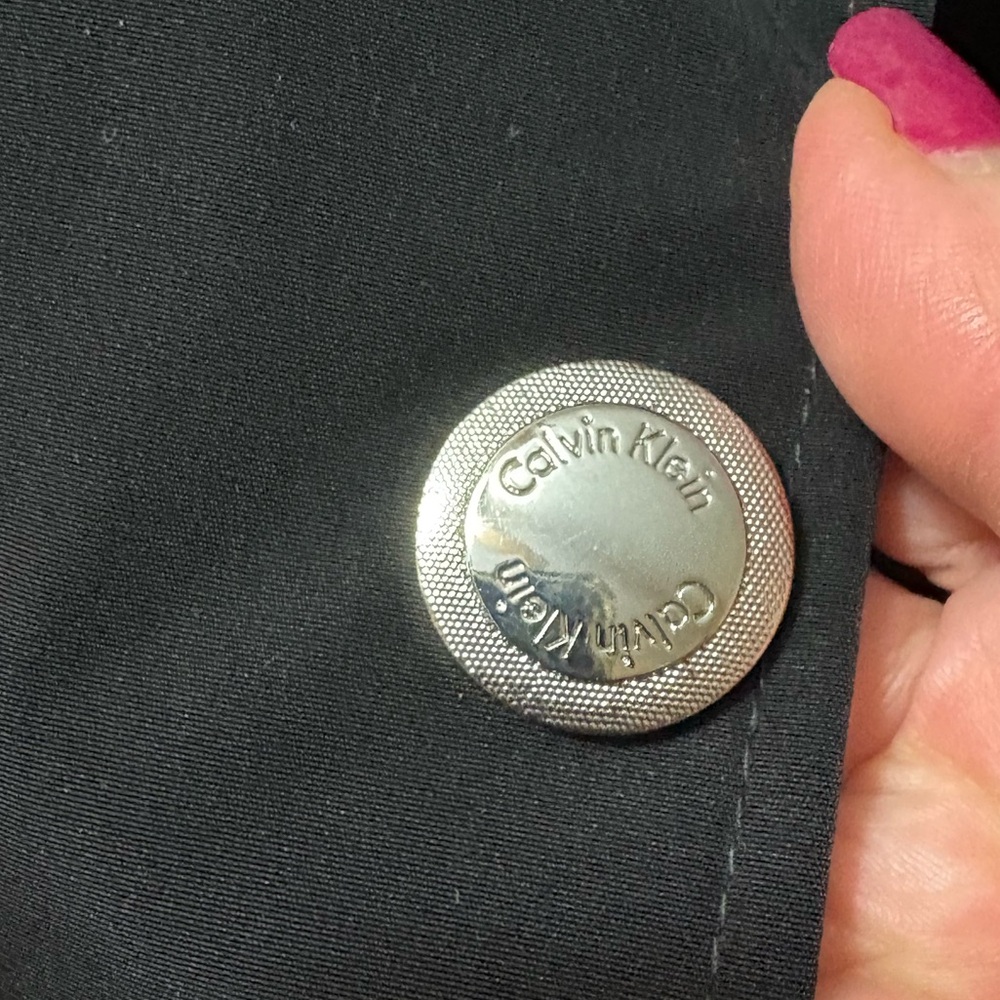 Calvin Klein-Classy black trench coat. Size small. Silver details/Hood. Like new - Picture 3 of 16